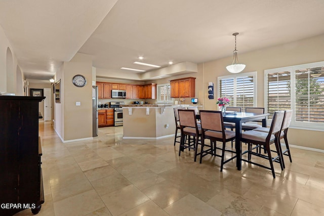 6310 Franklin Crest Dr, El Paso, TX 79912 - dining room featuring arched walkways and light tile patterned floors