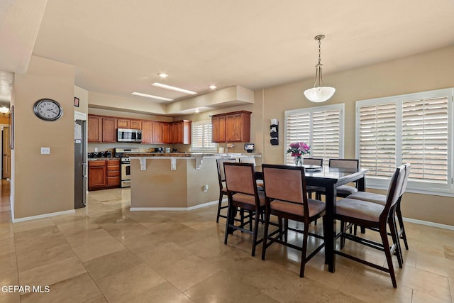 6310 Franklin Crest Dr, El Paso, TX 79912 - dining room with baseboards and recessed lighting