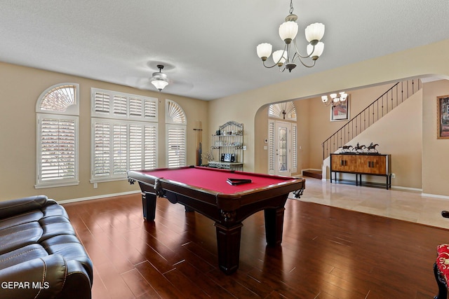 6310 Franklin Crest Dr, El Paso, TX 79912 - game room featuring arched walkways, a chandelier, wood finished floors, and pool table