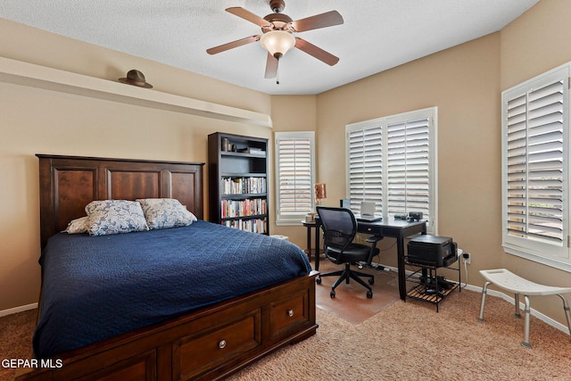 6310 Franklin Crest Dr, El Paso, TX 79912 - bedroom with light carpet, an office area, and ceiling fan