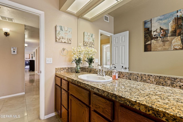 6310 Franklin Crest Dr, El Paso, TX 79912 - bathroom featuring vanity and tile patterned flooring