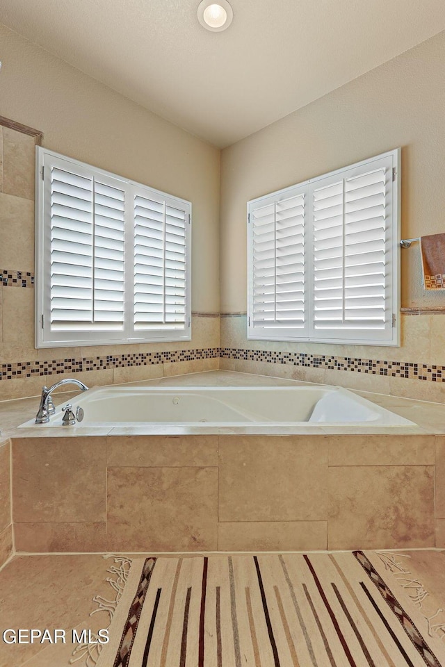 6310 Franklin Crest Dr, El Paso, TX 79912 - bathroom featuring a garden tub
