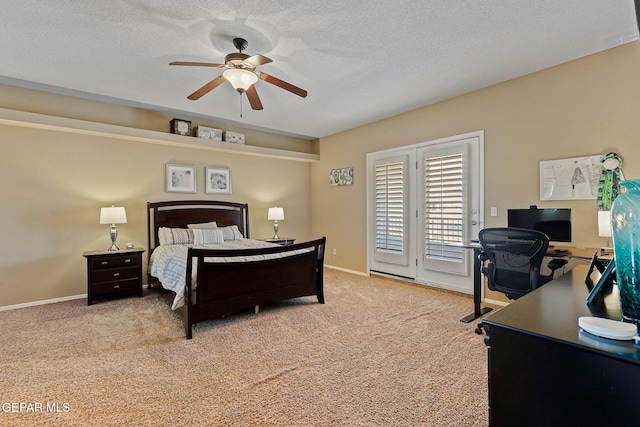 6310 Franklin Crest Dr, El Paso, TX 79912 - bedroom with access to outside, a desk, carpet flooring, ceiling fan, and a textured ceiling