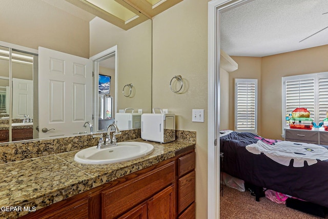 6310 Franklin Crest Dr, El Paso, TX 79912 - bathroom featuring ensuite bath and vanity
