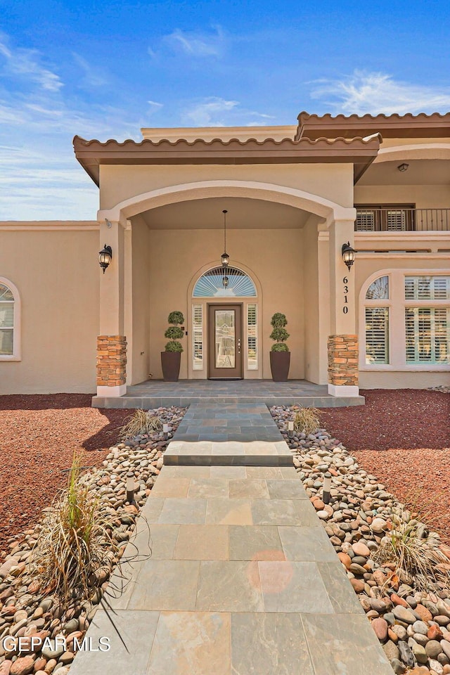 6310 Franklin Crest Dr, El Paso, TX 79912 - entrance to property featuring stucco siding and a porch