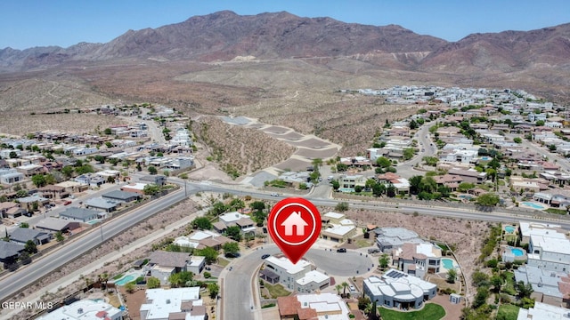 6310 Franklin Crest Dr, El Paso, TX 79912 - aerial view of property's location featuring a mountain backdrop and nearby suburban area