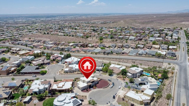 6310 Franklin Crest Dr, El Paso, TX 79912 - aerial view of property's location with nearby suburban area and a mountain backdrop