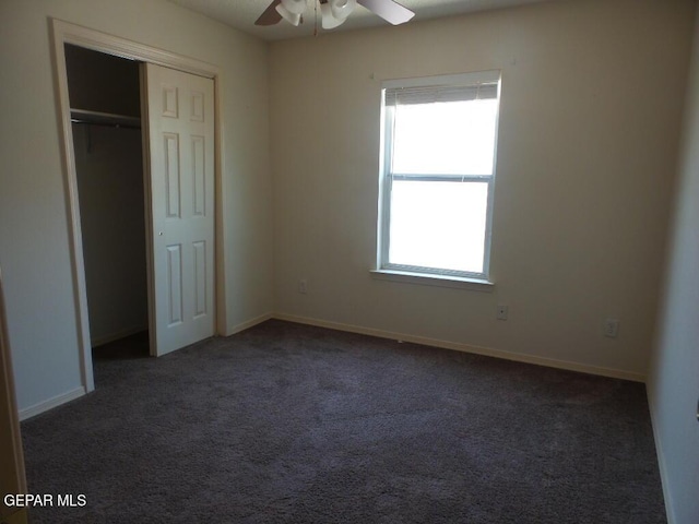 3204 Olive Point Dr, El Paso, TX 79938 - unfurnished bedroom featuring multiple windows, carpet flooring, a closet, and a ceiling fan