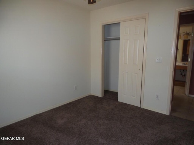 3204 Olive Point Dr, El Paso, TX 79938 - unfurnished bedroom with dark carpet and a closet