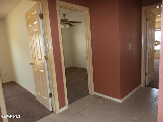 3204 Olive Point Dr, El Paso, TX 79938 - hall featuring light carpet and light tile patterned floors