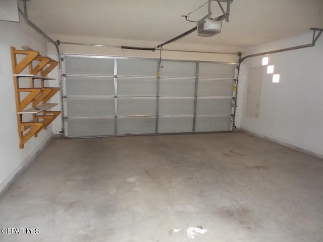 3204 Olive Point Dr, El Paso, TX 79938 - garage featuring a garage door opener