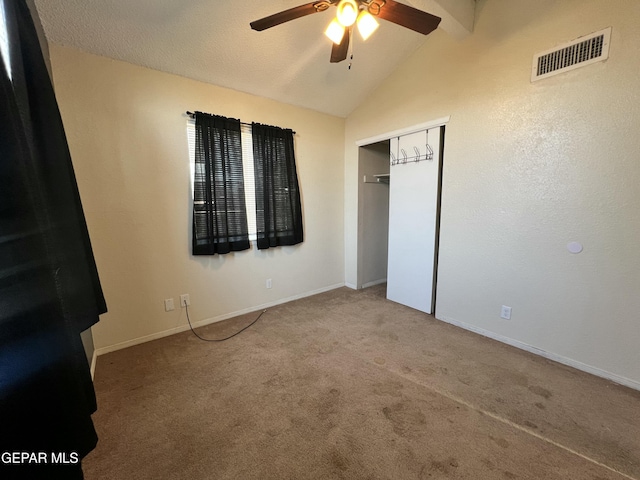 11713 Francis Scobee Dr, El Paso, TX 79936 - unfurnished bedroom featuring lofted ceiling, carpet floors, a closet, and ceiling fan