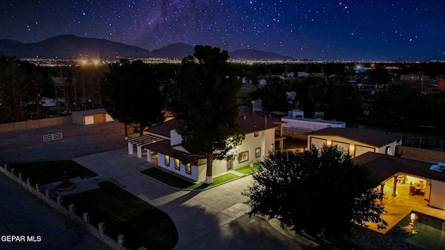 796 Fescue Dr, Canutillo, TX 79835 - aerial view at twilight of a mountain view