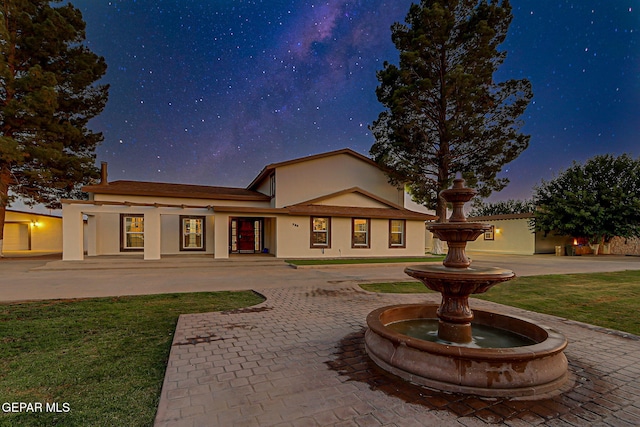 796 Fescue Dr, Canutillo, TX 79835 - view of front of property with stucco siding and a yard