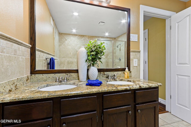 796 Fescue Dr, Canutillo, TX 79835 - full bathroom with double vanity, a shower, and tile patterned floors