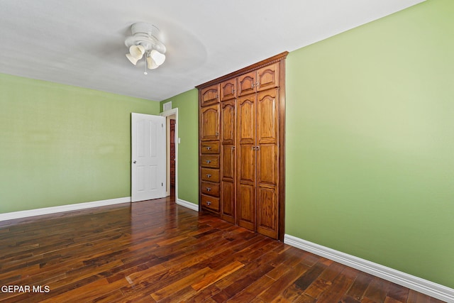 796 Fescue Dr, Canutillo, TX 79835 - unfurnished bedroom featuring dark wood-type flooring, a closet, and ceiling fan