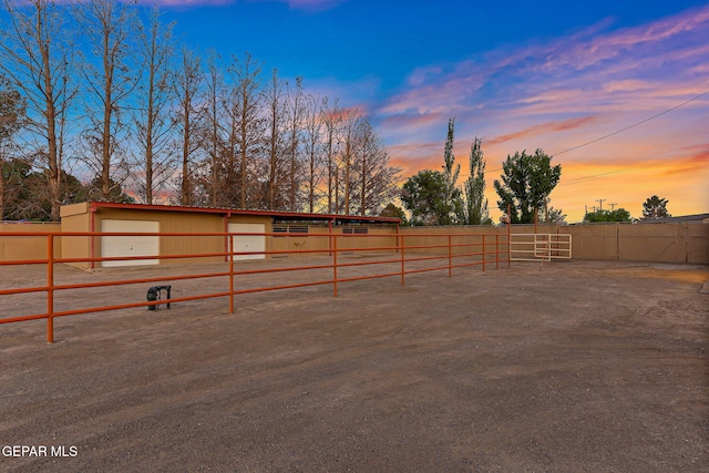 796 Fescue Dr, Canutillo, TX 79835 - yard at dusk featuring an exterior structure and an outdoor structure