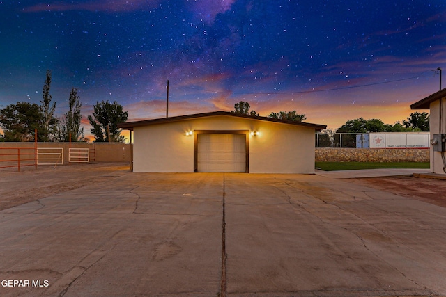 796 Fescue Dr, Canutillo, TX 79835 - garage at dusk with a detached garage