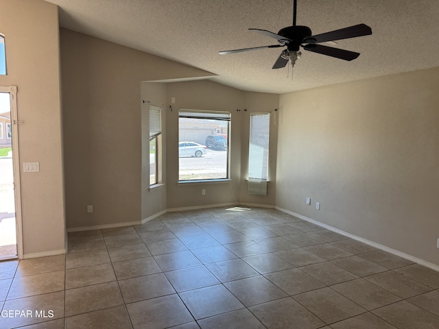 14325 Woods Point Ave, El Paso, TX 79938 - unfurnished room featuring tile patterned flooring, a textured ceiling, and ceiling fan