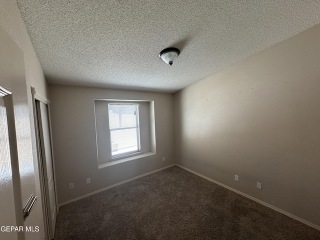 14325 Woods Point Ave, El Paso, TX 79938 - unfurnished room featuring a textured ceiling and carpet floors