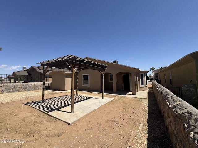 14325 Woods Point Ave, El Paso, TX 79938 - rear view of property with a pergola, a patio, and stucco siding