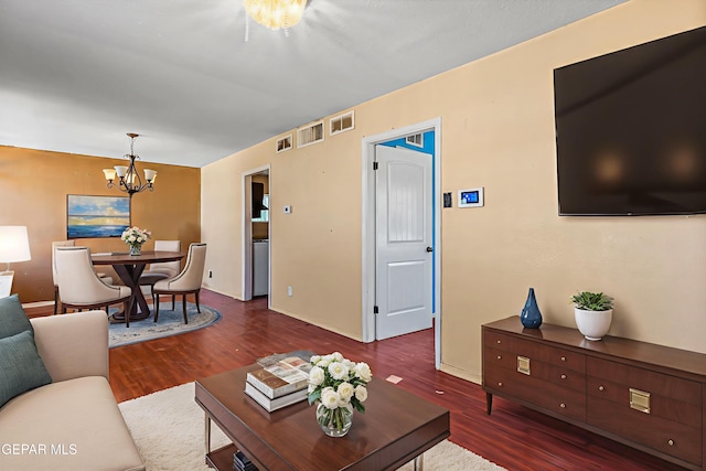 541 Val Verde St, El Paso, TX 79905 - living room featuring a chandelier and wood finished floors