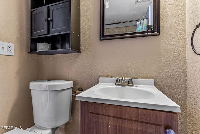 541 Val Verde St, El Paso, TX 79905 - bathroom featuring a textured wall and vanity