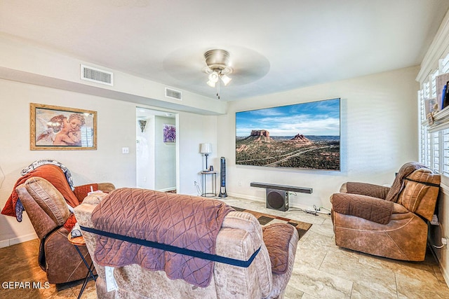 7366 Luz De Dia Ct, El Paso, TX 79912 - living room featuring a ceiling fan and baseboards