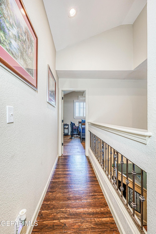 7366 Luz De Dia Ct, El Paso, TX 79912 - hall featuring wood finished floors, lofted ceiling, a textured wall, and recessed lighting