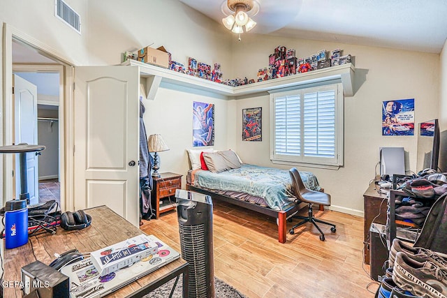 7366 Luz De Dia Ct, El Paso, TX 79912 - bedroom with vaulted ceiling, light wood-type flooring, and ceiling fan