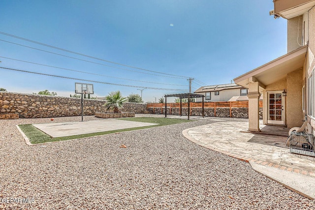 7366 Luz De Dia Ct, El Paso, TX 79912 - fenced backyard featuring a pergola and a patio area