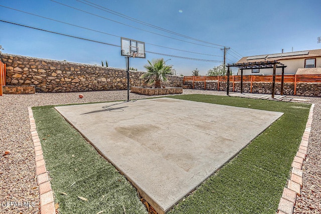 7366 Luz De Dia Ct, El Paso, TX 79912 - view of sport court with basketball court and a fenced backyard