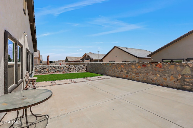 13860 Paseo Sereno Dr, El Paso, TX 79928 - fenced backyard featuring a patio