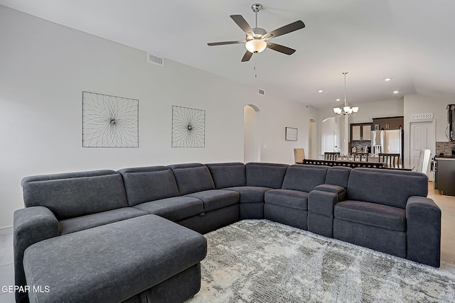 13860 Paseo Sereno Dr, El Paso, TX 79928 - living area with arched walkways, ceiling fan, a chandelier, and recessed lighting
