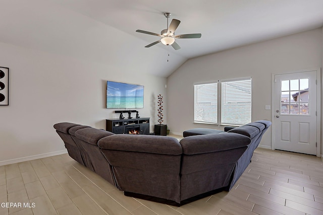 13860 Paseo Sereno Dr, El Paso, TX 79928 - living area with ceiling fan, vaulted ceiling, and light wood-style floors
