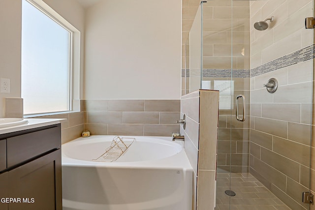 13860 Paseo Sereno Dr, El Paso, TX 79928 - bathroom with a stall shower, a bath, and vanity