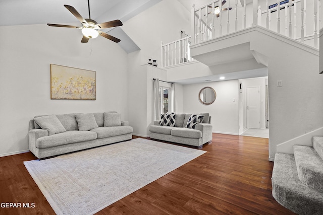 5713 Saplinas Rd, El Paso, TX 79932 - living area with stairs, a ceiling fan, a high ceiling, and dark wood finished floors