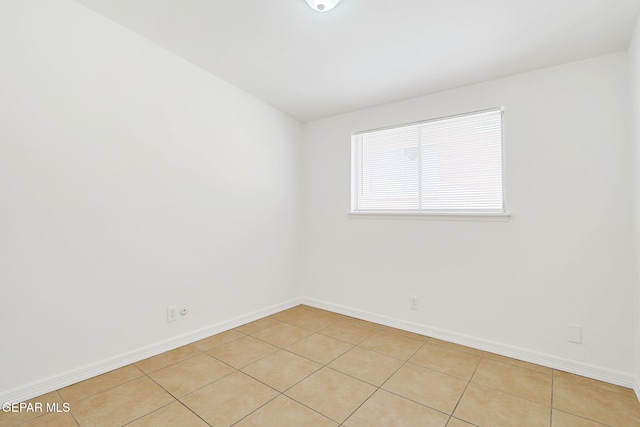 241 Mardi Gras Dr, El Paso, TX 79912 - empty room featuring light tile patterned floors and baseboards