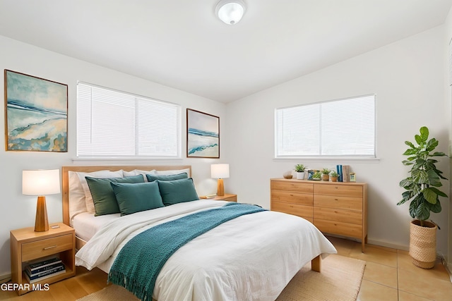 241 Mardi Gras Dr, El Paso, TX 79912 - bedroom featuring vaulted ceiling and light tile patterned floors