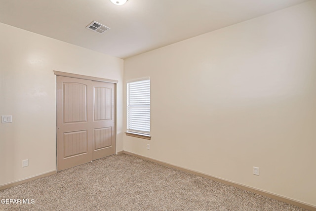 7825 Enchanted View Dr, El Paso, TX 79911 - spare room featuring light colored carpet and baseboards
