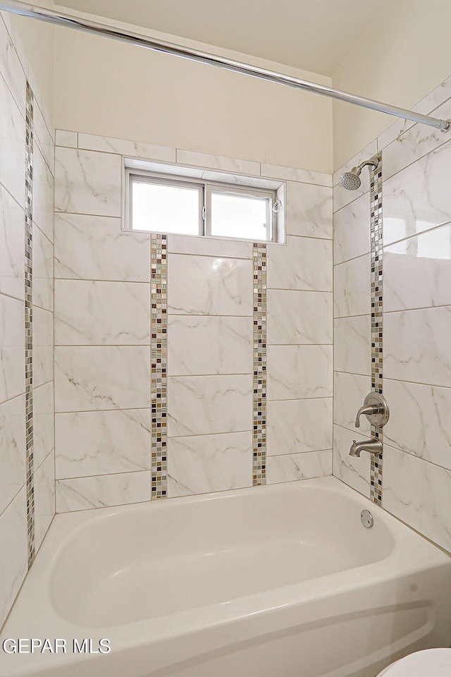 7825 Enchanted View Dr, El Paso, TX 79911 - bathroom featuring tub / shower combination and toilet