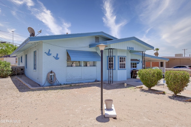 1268 Stanley St, El Paso, TX 79907 - back of property featuring brick siding