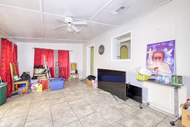 1268 Stanley St, El Paso, TX 79907 - tiled living room featuring ceiling fan