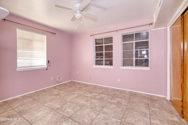 1268 Stanley St, El Paso, TX 79907 - empty room with ceiling fan and light tile patterned floors