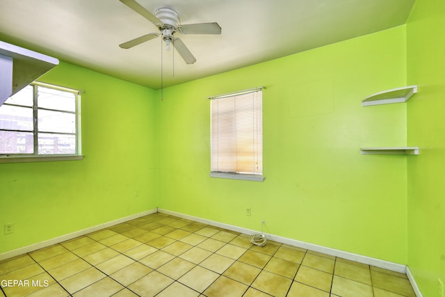 1268 Stanley St, El Paso, TX 79907 - unfurnished room with light tile patterned floors and a ceiling fan