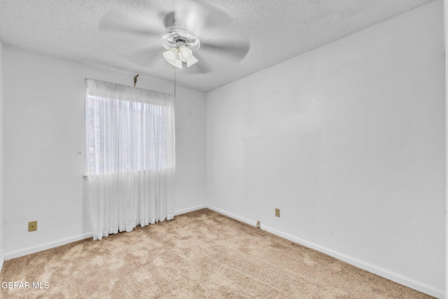 8763 Cathedral Cir, El Paso, TX 79907 - carpeted empty room with ceiling fan and a textured ceiling