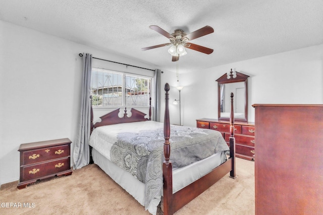8763 Cathedral Cir, El Paso, TX 79907 - bedroom with carpet floors, a textured ceiling, and ceiling fan
