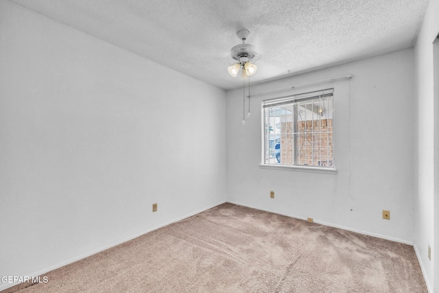 8763 Cathedral Cir, El Paso, TX 79907 - spare room with carpet, a textured ceiling, and ceiling fan