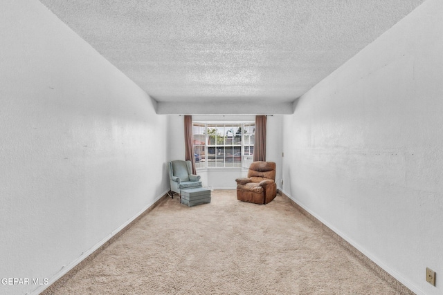 8763 Cathedral Cir, El Paso, TX 79907 - unfurnished room featuring a textured ceiling and carpet floors