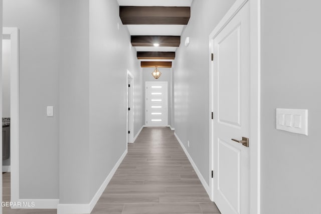 13829 Summer View Ave, Horizon City, TX 79928 - hall featuring light wood-type flooring and beam ceiling